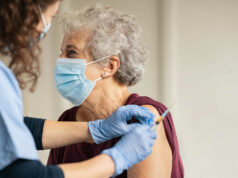 Woman gets vaccinated