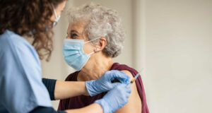 Woman gets vaccinated